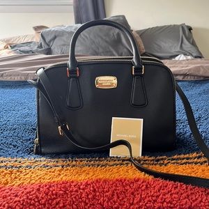 Michael Kors black pocket book